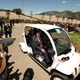 Illustration for article titled G8 Leaders Look Silly Shuttled Around In GEM Electric Cars